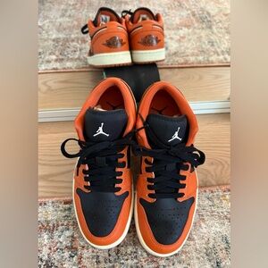 Jordan Black and Orange Low-Top Sneakers